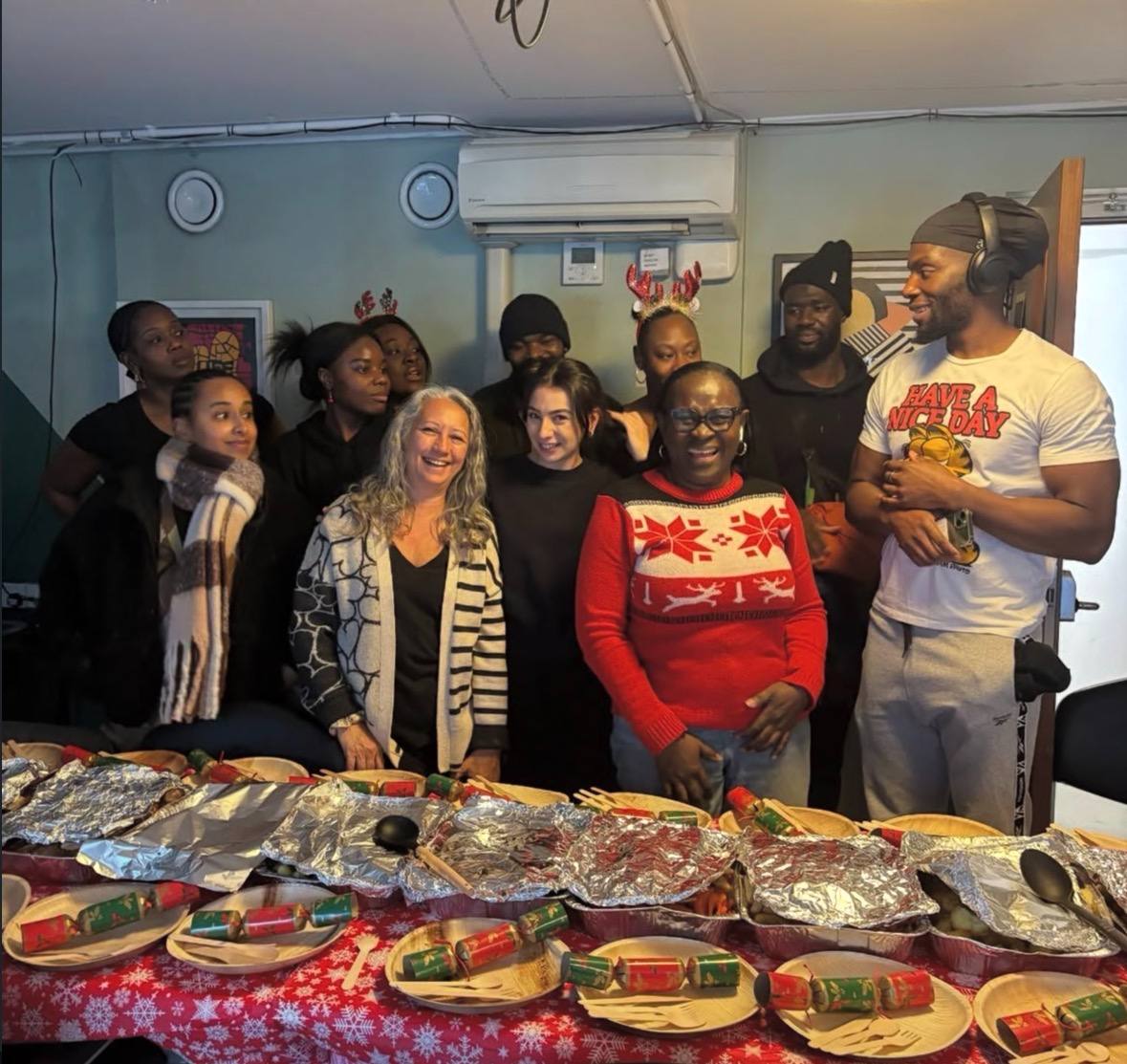 Volunteers at the hostel Christmas dinner table