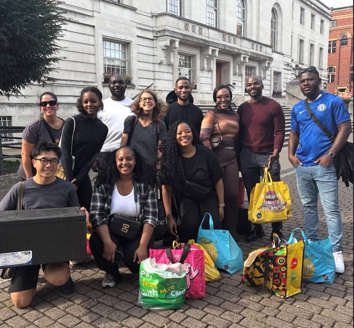 Volunteers with donations outside the town hall